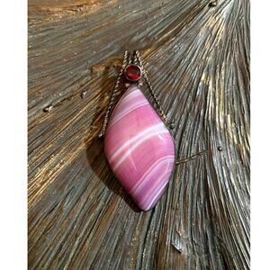 Lovely Pink Agate Pendant with a Red Rhinestone set in Gold Tone